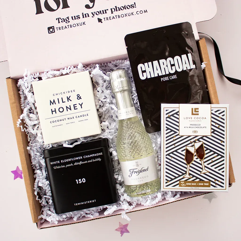 A gift box with candles and drinks